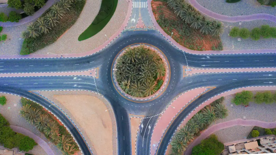Aerial view of a highway roundabout shot from a drone