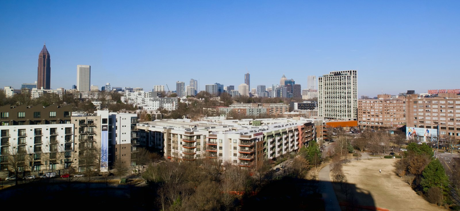 Atlanta skyline above in-town neighborhoods and trees