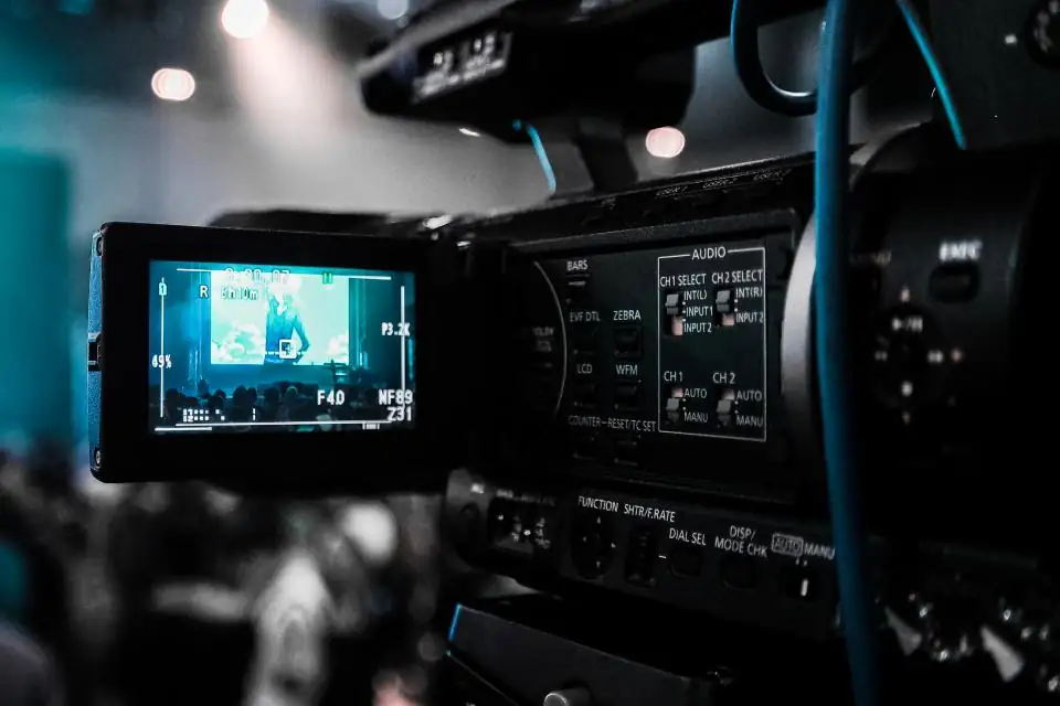 Close up of a cinema camera and monitor on a film set