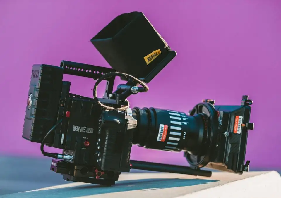 Cinema camera rig with a top monitor on a production table