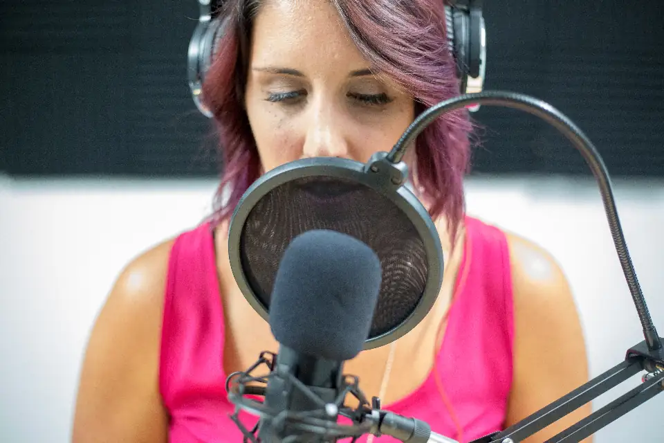 Speaker recording at a studio microphone