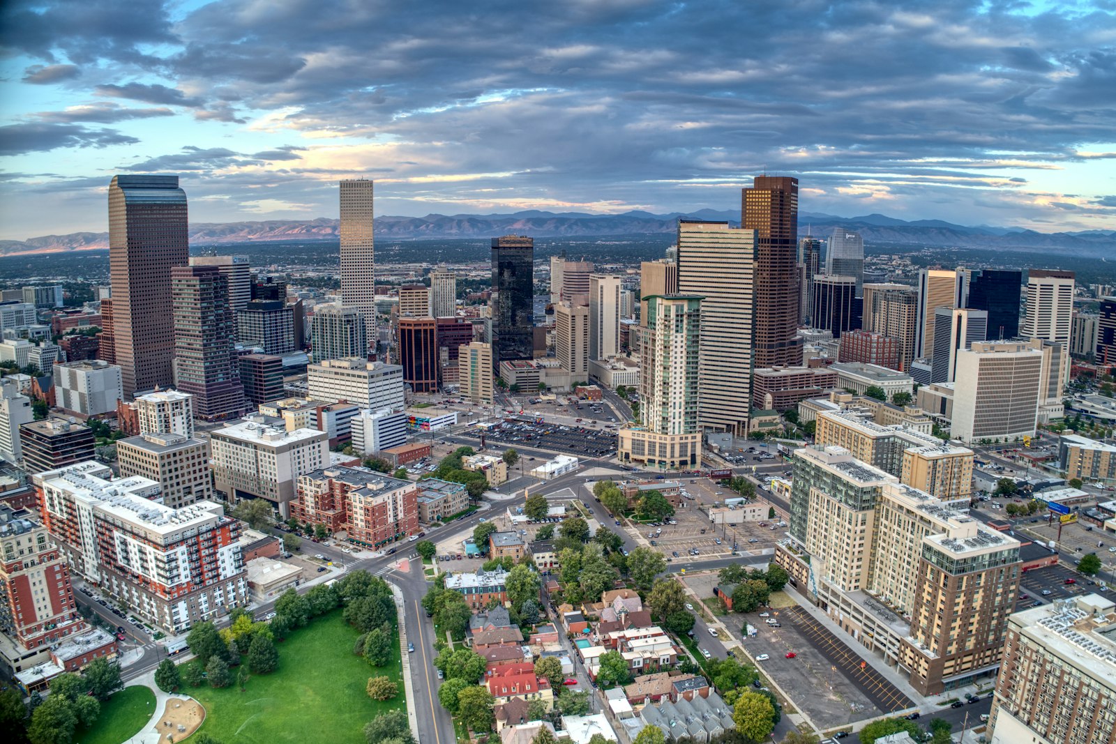 Downtown Denver at daybreak with the Rocky Mountains to the west