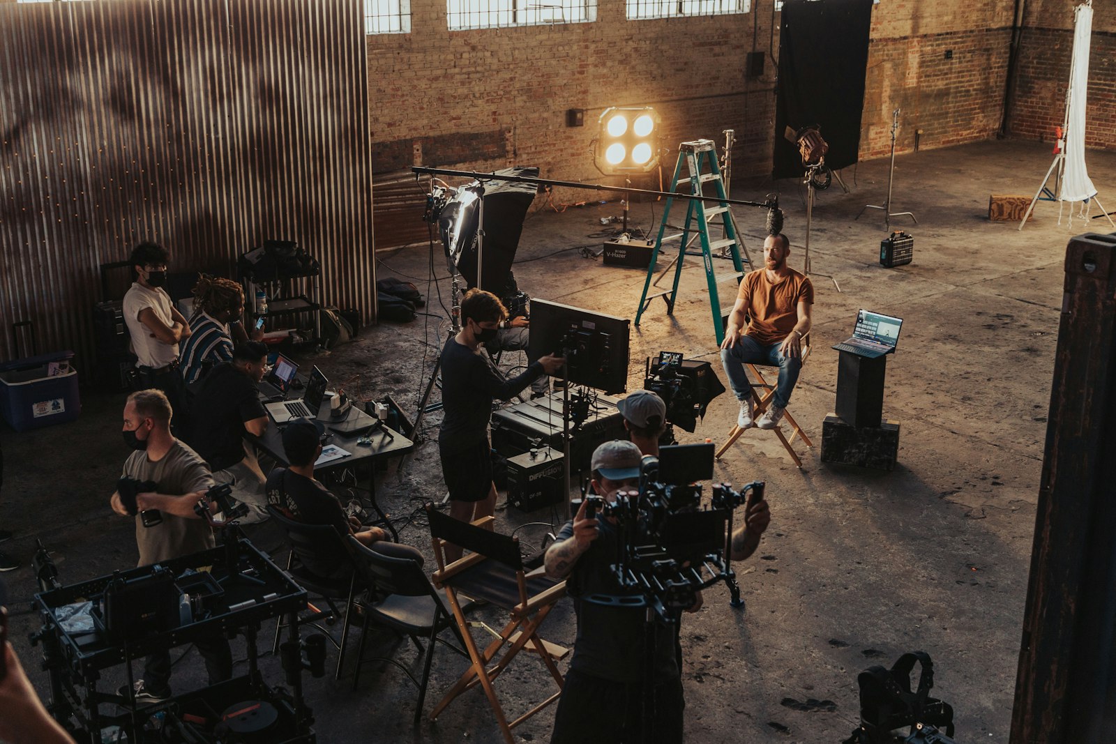 Camera crew setting up a cinema camera for a shoot
