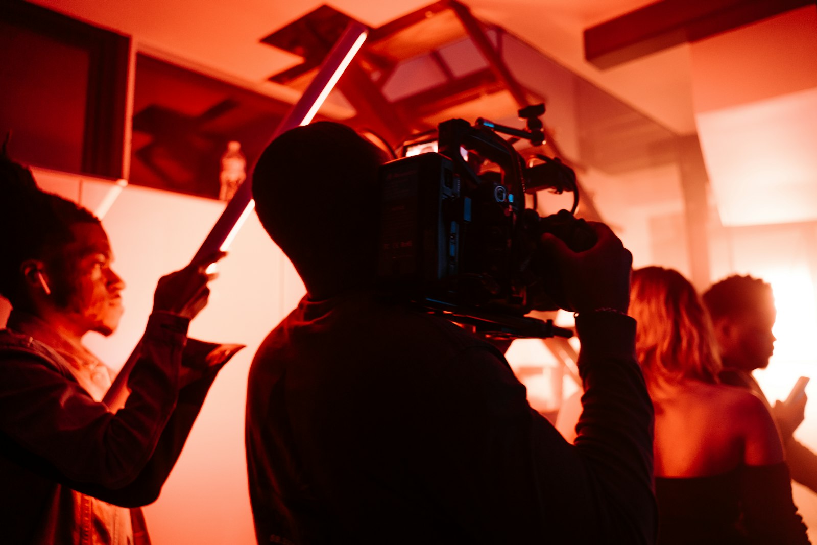 Crew member setting up a light for a shoot
