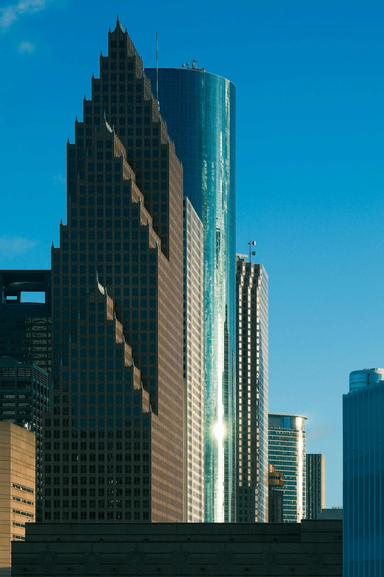 Downtown Houston towers lit by golden light