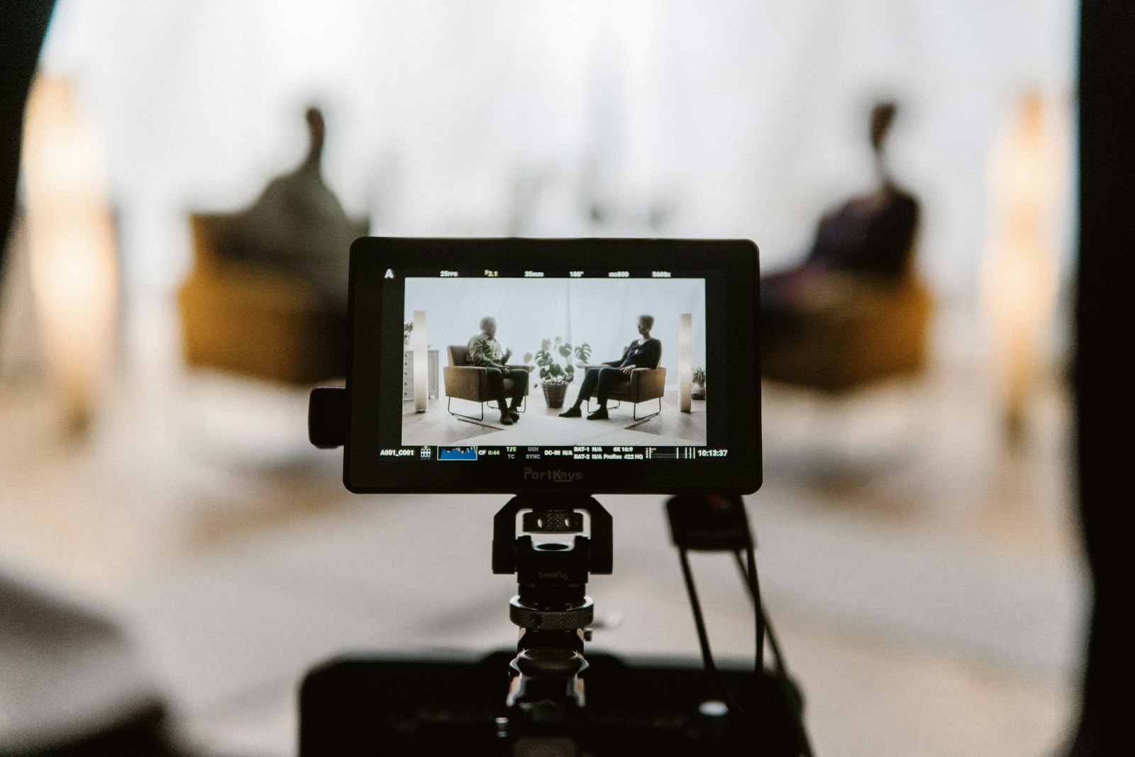 Camera monitor showing an interview setup