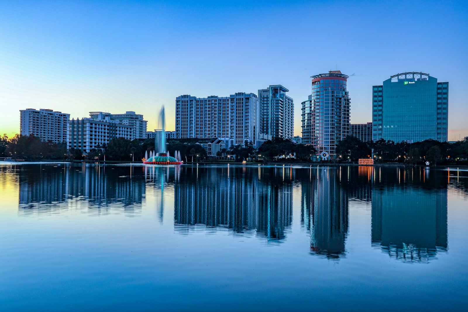 Downtown Orlando reflected in Lake Eola at sunrise